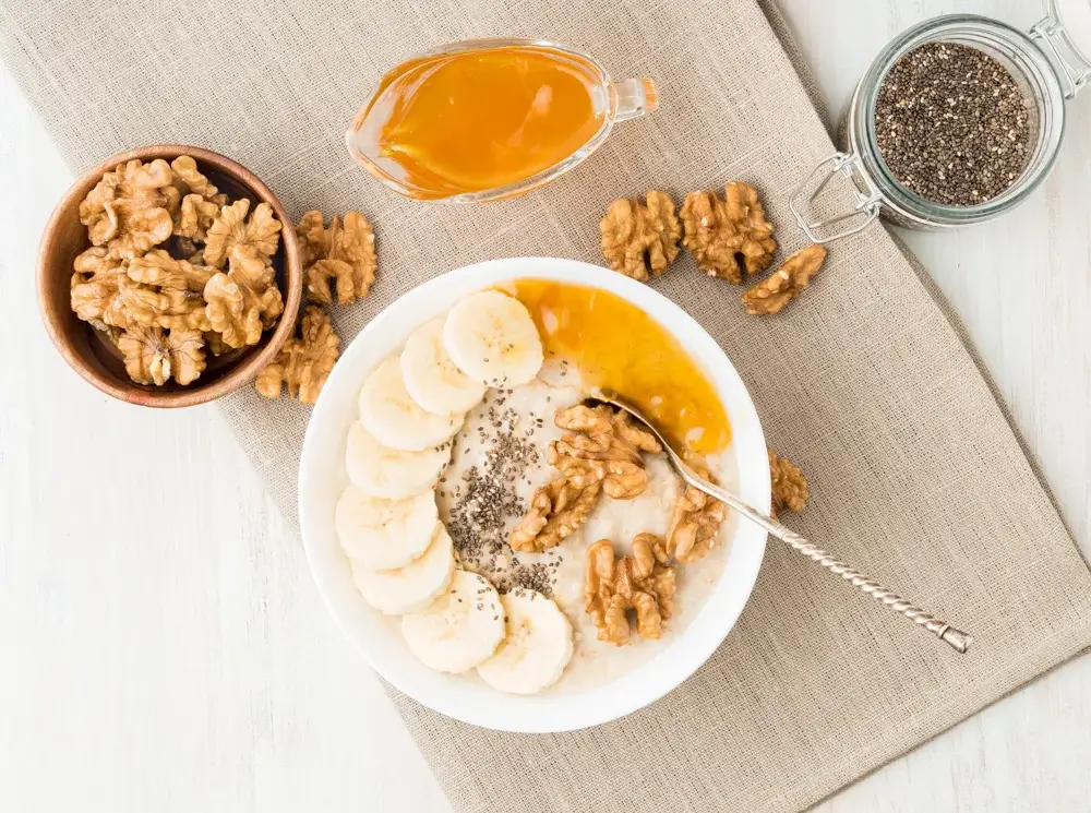 Overnight oats with chia seeds, sliced banana, and walnuts